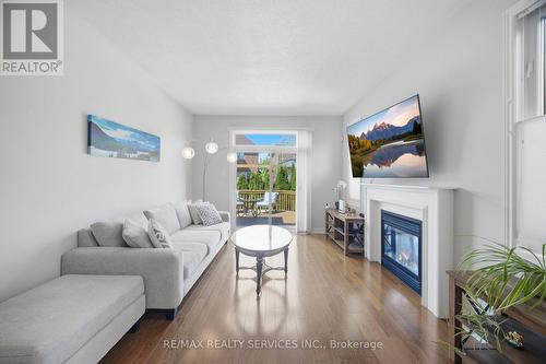 52 Atchison Drive, Caledon, ON - Indoor Photo Showing Living Room With Fireplace