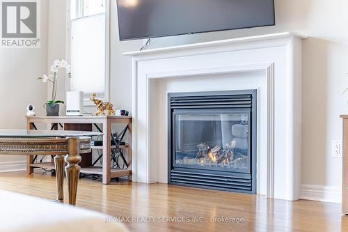 52 Atchison Drive, Caledon, ON - Indoor Photo Showing Living Room With Fireplace