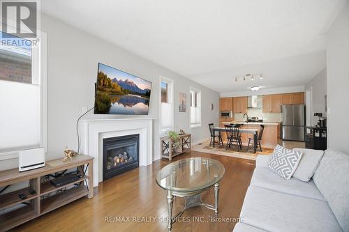 52 Atchison Drive, Caledon, ON - Indoor Photo Showing Living Room With Fireplace
