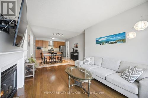52 Atchison Drive, Caledon, ON - Indoor Photo Showing Living Room With Fireplace