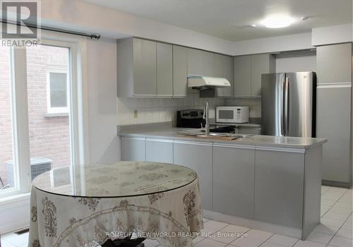 328 Port Royal Trail, Toronto, ON - Indoor Photo Showing Kitchen With Double Sink