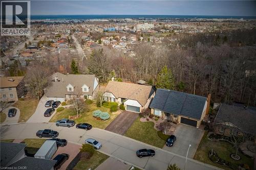 Aerial perspective showcasing three distinct residential properties - 39 Hilts Drive, Stoney Creek, ON - Outdoor With View