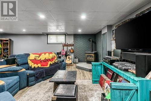 60 Allan, Coniston, ON - Indoor Photo Showing Basement With Fireplace
