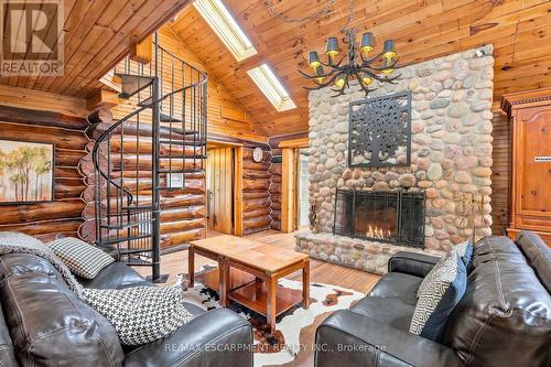678 Chantler Road, Pelham, ON - Indoor Photo Showing Living Room With Fireplace