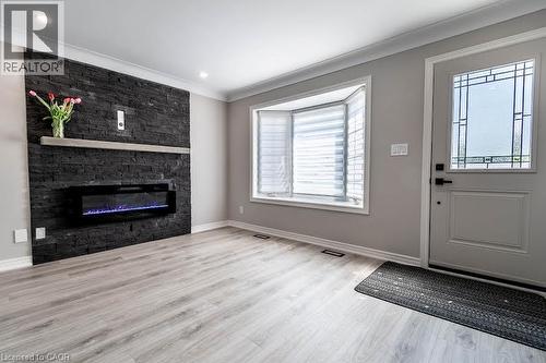 261 Scott Street Unit# B, St. Catharines, ON - Indoor Photo Showing Living Room With Fireplace