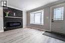 261 Scott Street Unit# B, St. Catharines, ON  - Indoor Photo Showing Living Room With Fireplace 