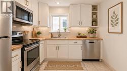 The kitchen has ample storage - 