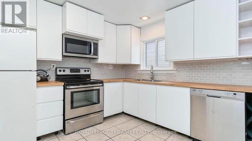 Main floor bathroom - 1291 Trafalgar Street, London East (East M), ON - Indoor Photo Showing Kitchen With Double Sink