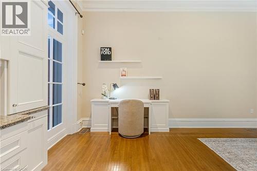 Unfurnished office with light wood finished floors and ornamental molding - 46 Herkimer Street Unit# 2, Hamilton, ON - Indoor Photo Showing Office