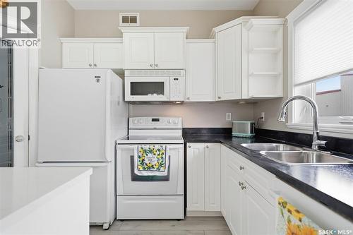8 320 3Rd Street, Osler, SK - Indoor Photo Showing Kitchen With Double Sink