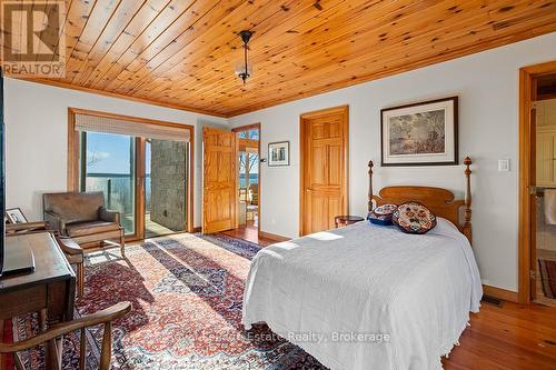 Primary suite with private deck. - 50 Nippissing Ridge Road, Tiny, ON - Indoor Photo Showing Bedroom