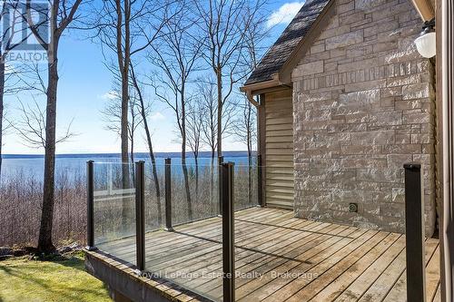 Private deck off primary suite on main floor. - 50 Nippissing Ridge Road, Tiny, ON - Outdoor With Deck Patio Veranda