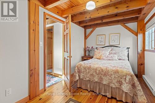 South bedroom on upper floor - 50 Nippissing Ridge Road, Tiny, ON - Indoor Photo Showing Bedroom