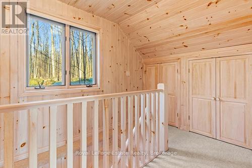 Stairs up from garage. - 50 Nippissing Ridge Road, Tiny, ON - Indoor Photo Showing Other Room