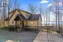 Fenced yard from front door to lower family room - 50 Nippissing Ridge Road, Tiny, ON  - Outdoor 