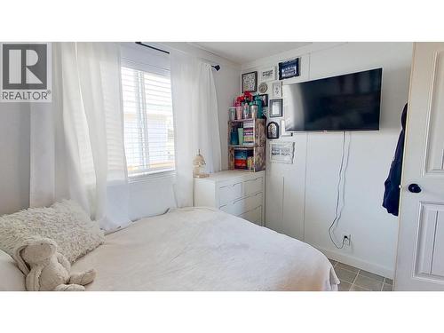 10074 99 Street, Taylor, BC - Indoor Photo Showing Bedroom