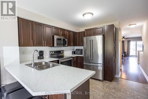 9 - 2224 Marble Crescent, Clarence-Rockland, ON - Indoor Photo Showing Kitchen With Stainless Steel Kitchen With Double Sink With Upgraded Kitchen