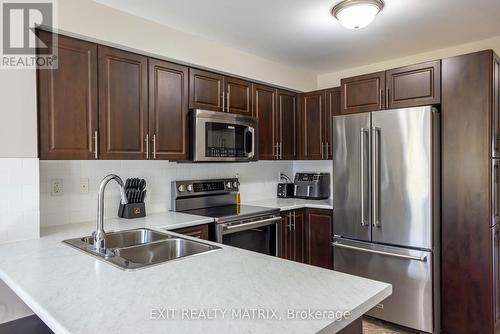 9 - 2224 Marble Crescent, Clarence-Rockland, ON - Indoor Photo Showing Kitchen With Stainless Steel Kitchen With Double Sink With Upgraded Kitchen