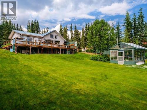 52 Lakeview Road, Whitehorse South, YT - Outdoor With Backyard
