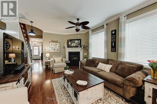 23 Covington Blue Crescent, Wasaga Beach, ON - Indoor Photo Showing Living Room With Fireplace