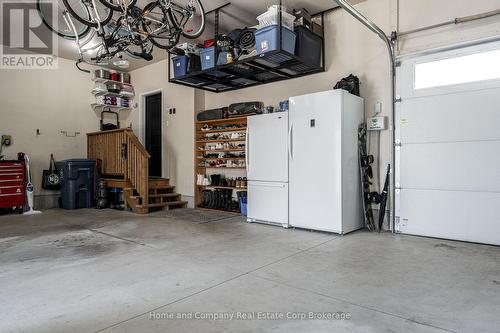 Garage Door to Back Yard - 3206 Vivian Line 37 Street, Stratford, ON - Indoor Photo Showing Garage