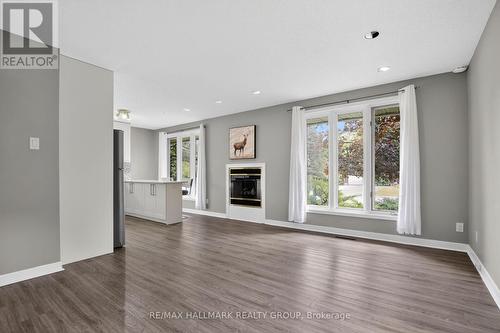 2 Birdstone Avenue, Ottawa, ON - Indoor Photo Showing Living Room With Fireplace