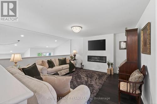 30 - 542 Crescendo Private, Ottawa, ON - Indoor Photo Showing Living Room With Fireplace