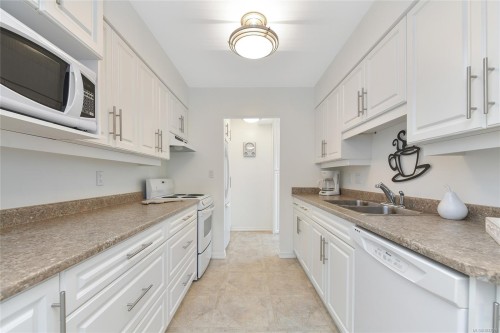 #111-9560 Fifth St, Sidney, BC - Indoor Photo Showing Kitchen With Double Sink