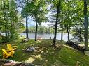 Family-friendly waterfront; firepit - 13 Peninsula Shores Road E, Mcdougall, ON  - Outdoor With Body Of Water 