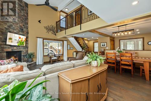13 Peninsula Shores Road E, Mcdougall, ON - Indoor With Fireplace