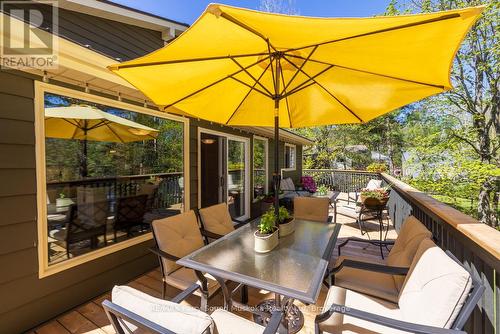 Lakeside dining/relaxing - 13 Peninsula Shores Road E, Mcdougall, ON - Outdoor With Deck Patio Veranda With Exterior