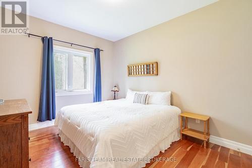 470 Baseline Road S, Tiny, ON - Indoor Photo Showing Bedroom