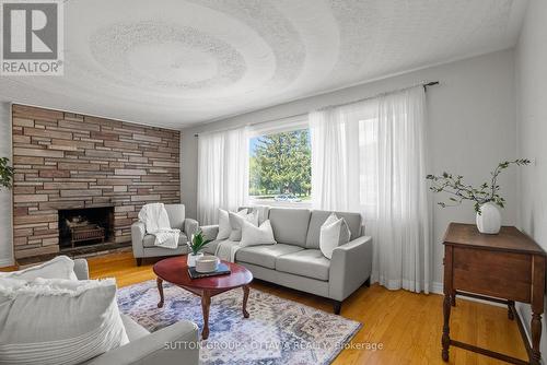 45 Larkspur Drive, Ottawa, ON - Indoor Photo Showing Living Room With Fireplace