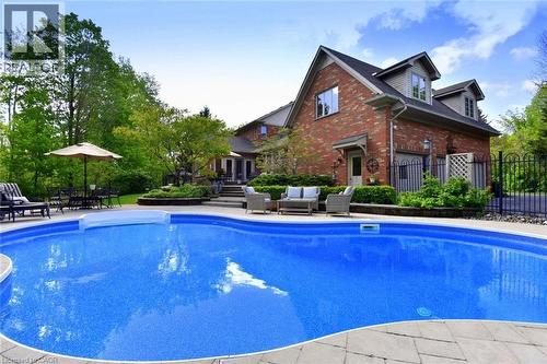 712 Robson Road, Waterdown, ON - Outdoor With In Ground Pool With Backyard