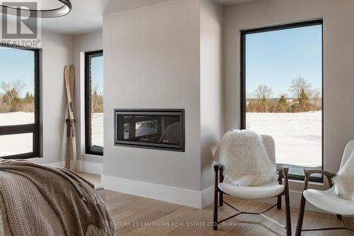 Primary Bed - 676 Foxton Road, Belleville (Thurlow Ward), ON - Indoor Photo Showing Living Room With Fireplace