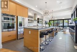 Main Floor: Kitchen with Step-Down Island - 