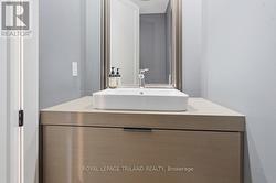 Main Floor: 2-Piece Bathroom - 