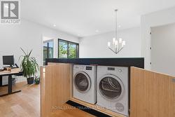 Upper Floor: Laundry Area - 