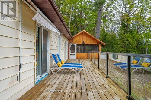 Expansive deck with glass railings - 1026 Carlson Place, Bracebridge (Draper), ON - Outdoor With Deck Patio Veranda With Exterior