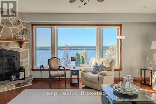 Georgian Bay Views - 502411 Grey Road 1 Road, Georgian Bluffs, ON - Indoor Photo Showing Living Room With Fireplace