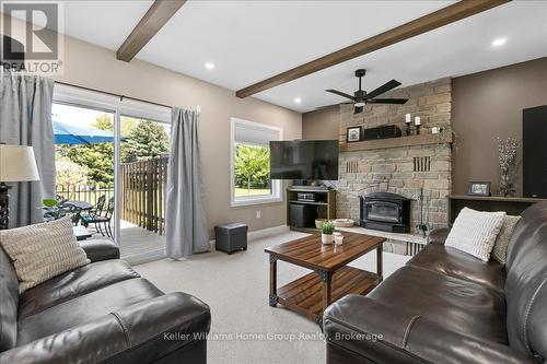 8 Stonefield Drive, Woolwich, ON - Indoor Photo Showing Living Room With Fireplace
