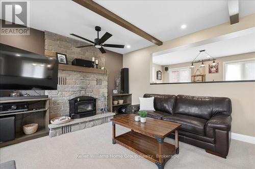8 Stonefield Drive, Woolwich, ON - Indoor Photo Showing Living Room With Fireplace
