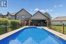 8 Stonefield Drive, Woolwich, ON  - Outdoor With In Ground Pool With Deck Patio Veranda 