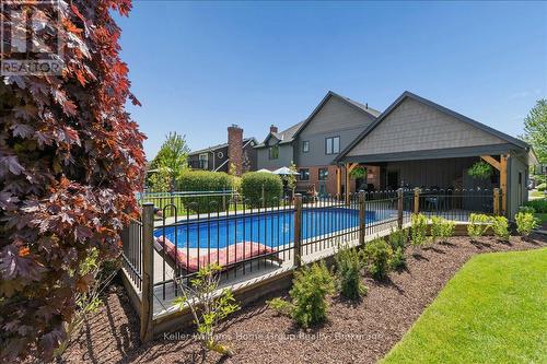 8 Stonefield Drive, Woolwich, ON - Outdoor With In Ground Pool With Deck Patio Veranda