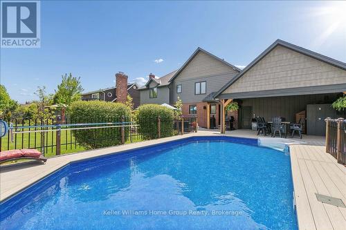 8 Stonefield Drive, Woolwich, ON - Outdoor With In Ground Pool With Deck Patio Veranda