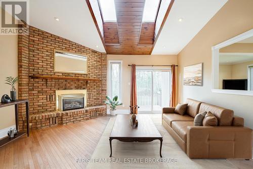 Virtually Staged - 21 Poplar Crescent, Oro-Medonte, ON - Indoor Photo Showing Living Room With Fireplace