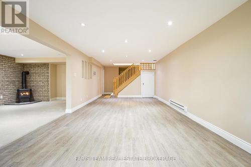 21 Poplar Crescent, Oro-Medonte, ON - Indoor Photo Showing Other Room With Fireplace