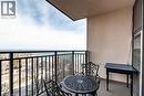 Outdoor balcony featuring a metal railing and a serene water backdrop - 500 Green Road Unit# 901, Stoney Creek, ON  - Outdoor With Balcony With Exterior 