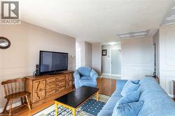 Hardwood-finish flooring complementing light-toned walls - 