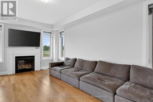 175 St Joseph Road, Kawartha Lakes (Lindsay), ON - Indoor Photo Showing Living Room With Fireplace